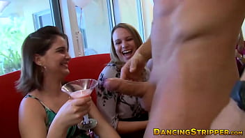 Slutty Babes Take Turns Sucking Off Hunky Male Stripper