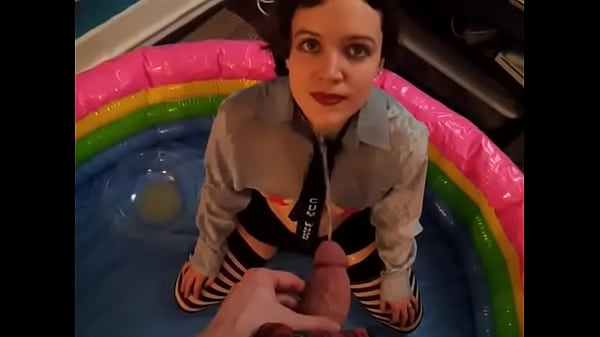 Cute Clothed Girl Smiling And Pissed On