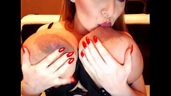 Micky Playing With Her Huge Tits On Cam