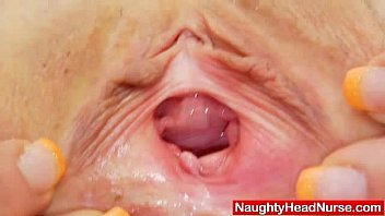 Milada, The Hot Mama Nurse, Examines Her Pink Cooter With A Latex Cock