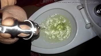 Tomsfag Pissing In The Public Toilet While Locked In A Chastity Cage