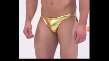 Guy In Metallic Golden Bikini