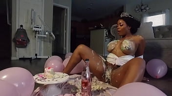Ebony Model Enjoys Birthday Cake