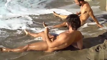 Two Gay Friends Stroking At The Beach