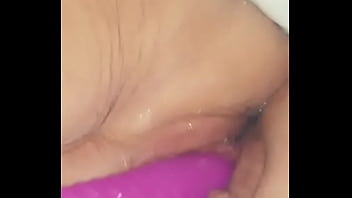 Squirting With Purple Dildo