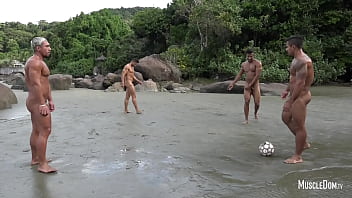 Naked Football On The Beach
