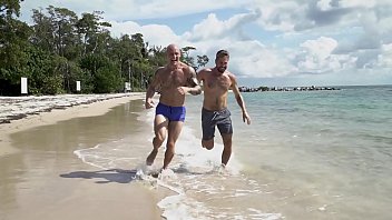 Gaywire - Trevor Laster Gets A Good Pump On The Beach With Help From Wesley Woods