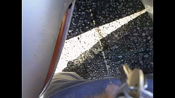 Pissing Between Two Cars