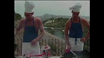 Couple Of The Naked Chef Paul Morgan' Assistants Matt Young And Marc Hamilton Try To Prepare Barbeque Sausages In Their Own Way
