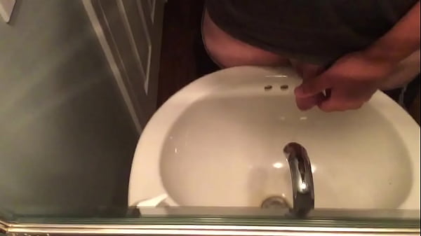 Pissing Into The Sink