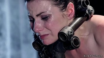 Helpless Brunette In Metal Devices