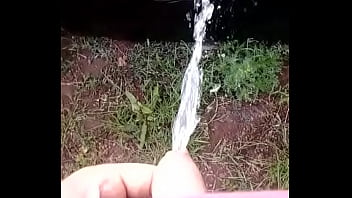 Peeing Against A Bale