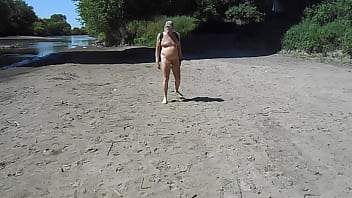 Naked Driver Pisses In The Sand Along The Skunk River