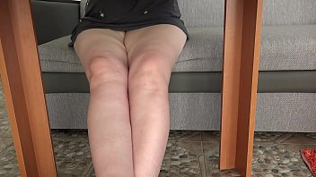A Hidden Camera Under The Table Spies On Plump Legs And Peeks Under The Skirt While A Mature Housewife Drinks Tea. Amateur Foot Fetish.
