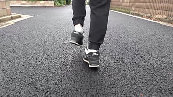 Shoes Fetish A Girl Who Is Walking In Big Shoes And Is Likely To Take Off