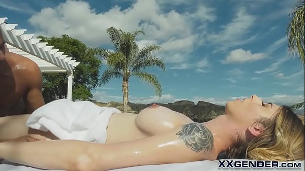 Oiled Tranny Sucks Masseurs Cock