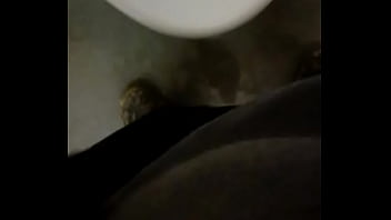 Peeing Into A Urinal In Work