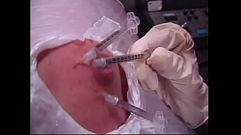 A Naughty Brunette And A Busty Redhead Bitches Wrapped A Guy' Body With A Film And Injected Him With Syringes