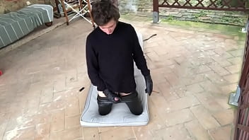 Fetish With Leather Pants And Cigar