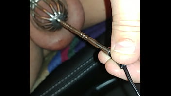Probe In A Caged Penis