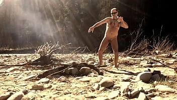 Nudist Dancer At The Campfire