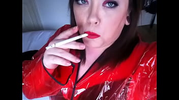 Fat Uk Slut In Pvc Mac Smoking
