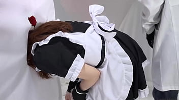 A Girl Whose Head Is Caught In The Wall And Her Panties Are Exposed From Her Skirt