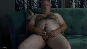 Jacking Off On The Hotel Sofa While Watching Porn