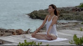 Asian Angel Undressing By The Ocean