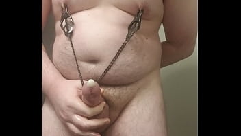 Fat Boy With Nipple Clamps On Masturbates Into A Condom And Cums 3 Times