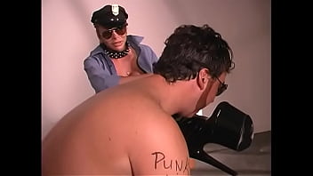 Prison Guard Whore Wearing Big Latex Boots Makes Submissive Guy Lick Feet