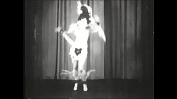 Retro Whore Performing Strip Dance On Stage
