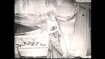 Gorgeous Retro Bitch Stripping Of Robes On Set