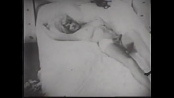 Busty Pornstar In Black Lingerie Caresses Her Wet Pussy In 60s Erotic Movie