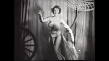 Busty Scheherazade Dances Erotically On Stage And Takes Off Her Oriental Outfit