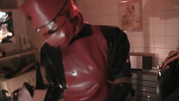 Rubbernurse Agnes - Long Black Latex Nurse Dress, Clinic Red Apron And Mask - Pegging The Clinic Slave With A Really Long Dildo Until He Squirts All His Spermcream Out