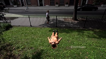 Sunbathing Next To The Side Walk