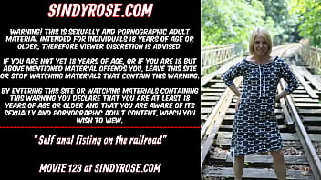 Self Anal Fisting On The Railroad