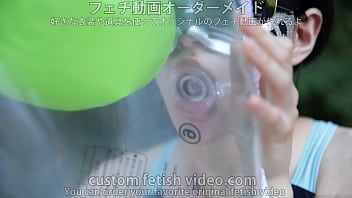 A Woman Putting Air Into A Float.