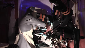 Rubbernurse Agnes - Long Grey Latex Nurse Dress - A Short Elbow Deep Analfist Session With Final Cumshot Relief