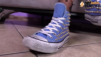 Sexy Brunette Katy Takes Off Her Allstar Sneakers, Then A Pair Of Nylon Socks. She Then Puts Her Bare Feet On A Table...