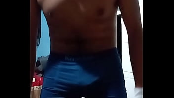 David Wearing His Old Uniform (bartender) Strips For The Camera