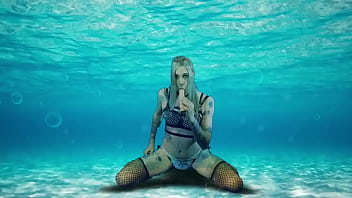 Underwater Babe Dances And Plays With Her Clitty