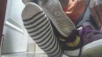 Red Sneakers And Sweaty Socks After A Long Day