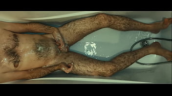 Hairy Guy Take A Bath And Pissing On Himself