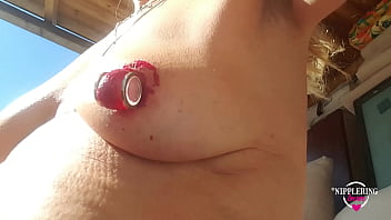 Nippleringlover Hot Nude Outdoors Peeling Huge Red Painted Pierced Nipples Close Up