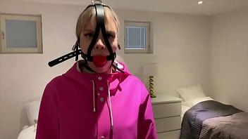 Vanessa In Heavy Rainwear And Gag.