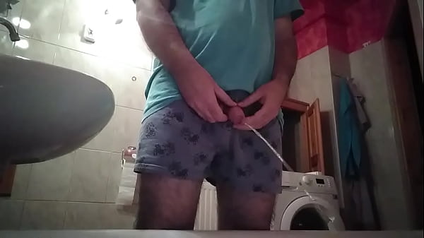 Naughty Guy Pees In The Bathroom And Then Jerks His Uncut Dick!