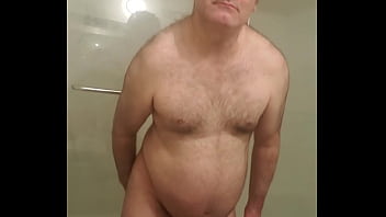 Nude Martin Lavallée Sodomizes Himself And Compares His Red Dildo With His Small Black Chastity Device