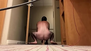 Riding A Dildo With The Hotel Door Open